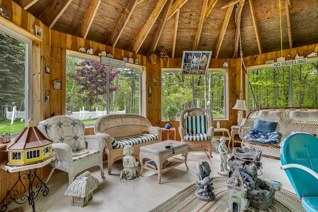 19 Rumery Rd, Lyman, ME 04002 - sunroom / solarium with vaulted ceiling, wooden walls, and concrete flooring