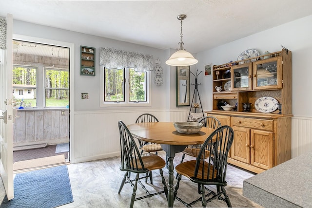 19 Rumery Rd, Lyman, ME 04002 - dining room with a wainscoted wall, plenty of natural light, and wooden walls