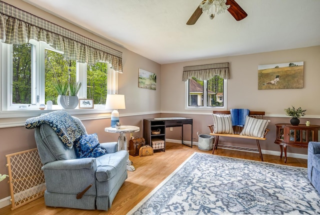 19 Rumery Rd, Lyman, ME 04002 - sitting room with ceiling fan, wood finished floors, and baseboards