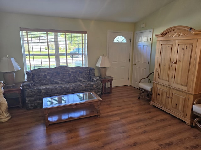 83 Clover Ln, Auburn, ME 04210 - living room featuring wood finished floors and vaulted ceiling