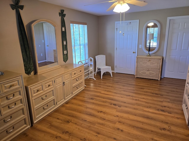 83 Clover Ln, Auburn, ME 04210 - sitting room featuring wood finished floors, a ceiling fan, healthy amount of natural light, and baseboards
