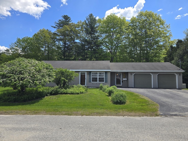 83 Clover Ln, Auburn, ME 04210 - single story home featuring an attached garage, driveway, and a front yard