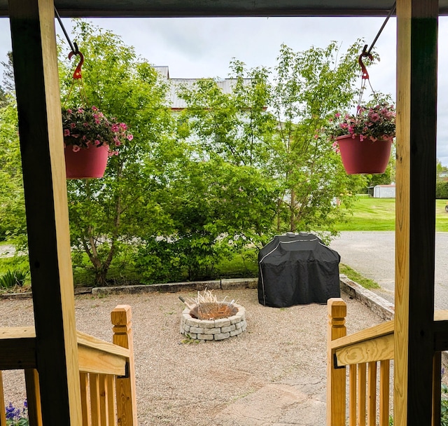 191 Bates St, Pittsfield, ME 04967 - view of patio / terrace featuring a fire pit and grilling area