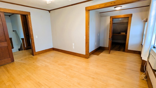 191 Bates St, Pittsfield, ME 04967 - spare room featuring light wood-style floors and crown molding