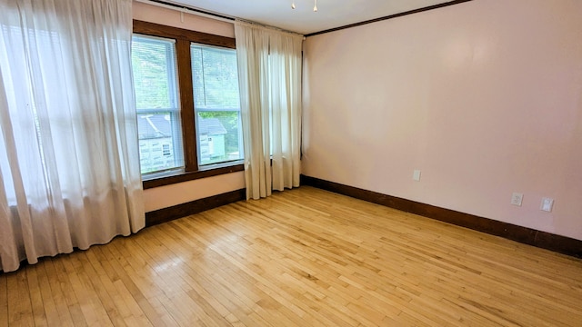 191 Bates St, Pittsfield, ME 04967 - spare room with light wood-style floors and healthy amount of natural light