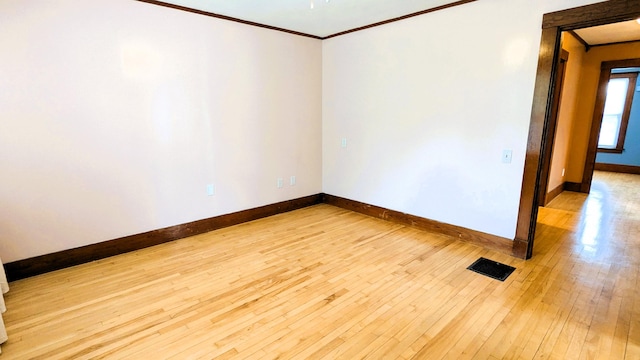 191 Bates St, Pittsfield, ME 04967 - unfurnished room featuring crown molding and hardwood / wood-style floors