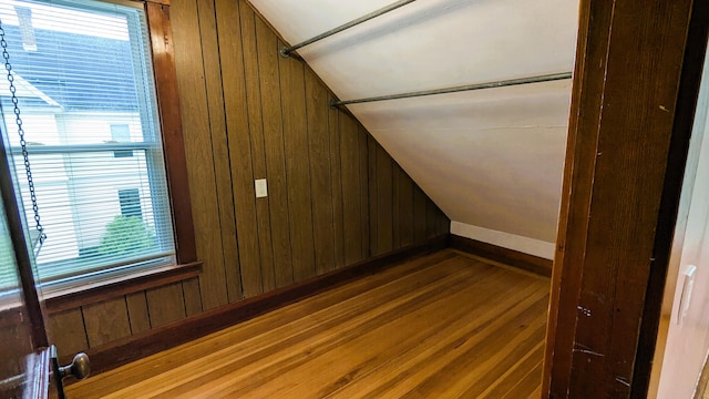 191 Bates St, Pittsfield, ME 04967 - unfurnished room with lofted ceiling, wood finished floors, and wood walls