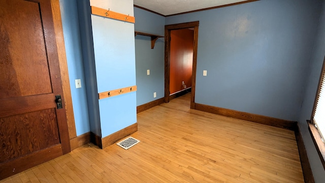 191 Bates St, Pittsfield, ME 04967 - spare room with ornamental molding and light wood finished floors