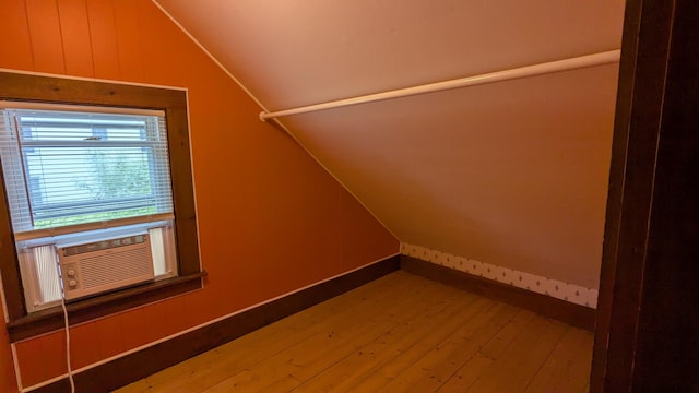 191 Bates St, Pittsfield, ME 04967 - additional living space featuring lofted ceiling, wood finished floors, and cooling unit