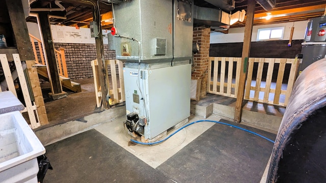 191 Bates St, Pittsfield, ME 04967 - below grade area with heating unit