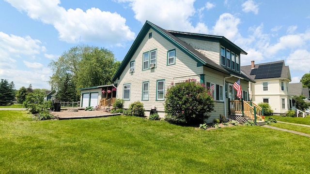 191 Bates St, Pittsfield, ME 04967 - rear view of house featuring an outdoor structure and a lawn