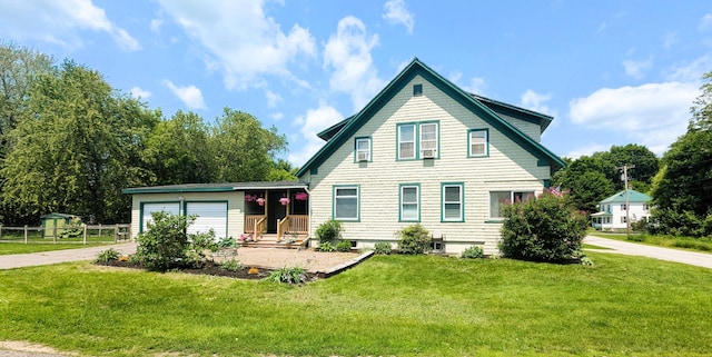 191 Bates St, Pittsfield, ME 04967 - view of front of property featuring driveway, an attached garage, and a front lawn