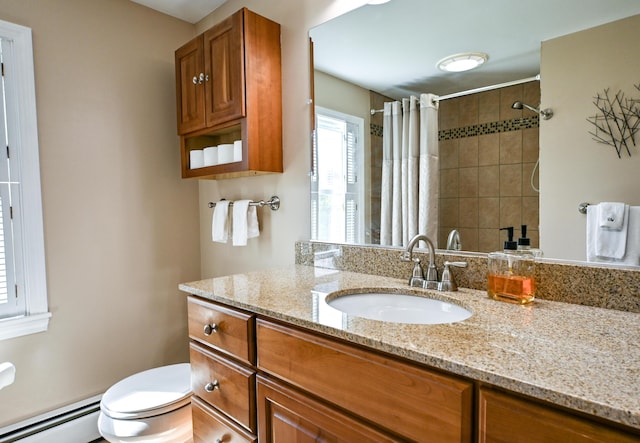 77 Carter St, Portland, ME 04103 - full bathroom with a baseboard radiator, vanity, toilet, and a tile shower