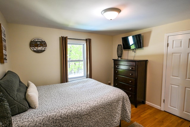 77 Carter St, Portland, ME 04103 - bedroom with wood finished floors and baseboards