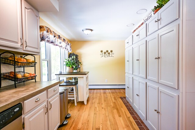 77 Carter St, Portland, ME 04103 - hall with baseboard heating, light wood-style flooring, and baseboards