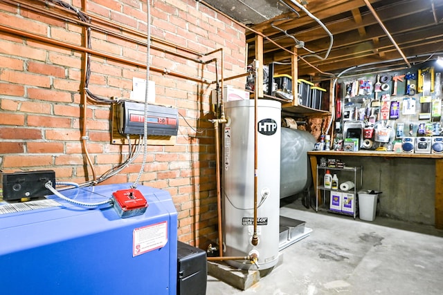77 Carter St, Portland, ME 04103 - utility room with gas water heater, oil tank, and a heating unit