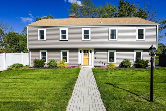 77 Carter St, Portland, ME 04103 - colonial inspired home featuring a chimney and a shingled roof