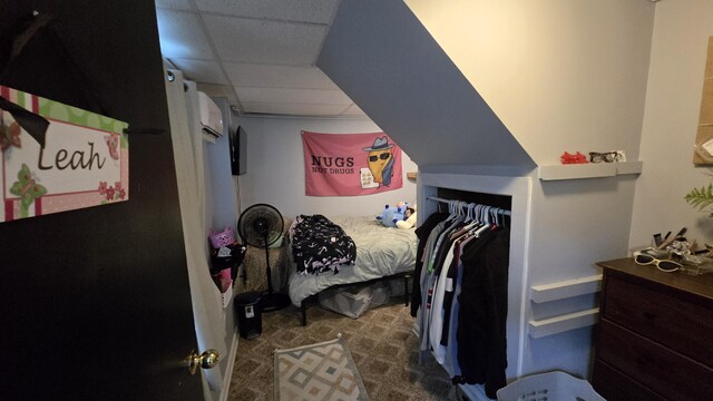 2 Fairview Ave, Houlton, ME 04730 - bedroom featuring carpet, a drop ceiling, and a wall mounted air conditioner