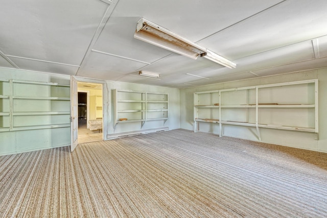 26 Unity Rd, Albion, ME 04910 - carpeted empty room with built in shelves and attic access