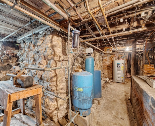 26 Unity Rd, Albion, ME 04910 - unfinished below grade area with electric water heater and a water pressure tank