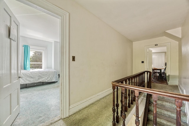 26 Unity Rd, Albion, ME 04910 - corridor with carpet flooring, vaulted ceiling, and baseboards