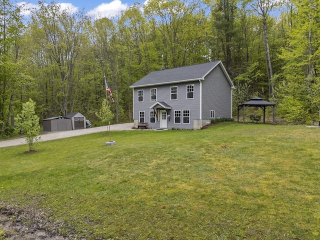2 Ball Park Rd, Lewiston, ME 04240 - view of front facade featuring a gazebo, a front lawn, and a view of trees