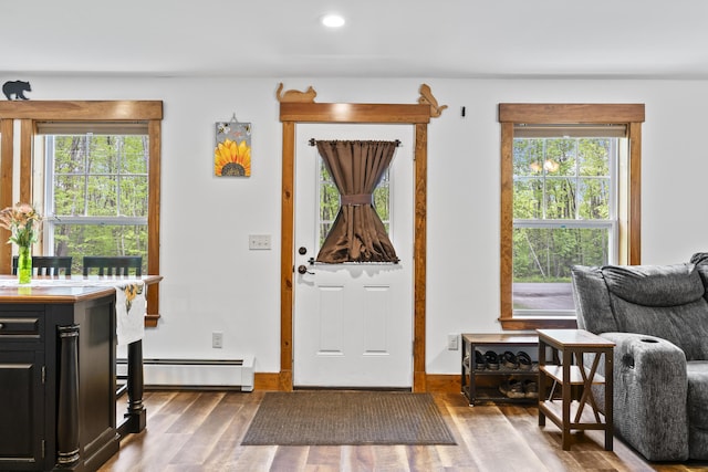 2 Ball Park Rd, Lewiston, ME 04240 - entryway with wood finished floors, recessed lighting, and a baseboard radiator