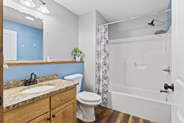 2 Ball Park Rd, Lewiston, ME 04240 - bathroom featuring toilet, vanity, shower / bath combo, and wood finished floors
