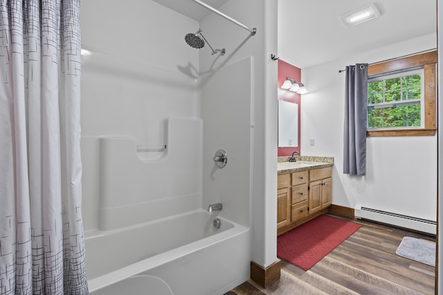 2 Ball Park Rd, Lewiston, ME 04240 - bathroom featuring a baseboard heating unit, shower / bath combo with shower curtain, vanity, wood finished floors, and baseboards