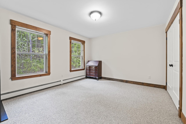 2 Ball Park Rd, Lewiston, ME 04240 - unfurnished bedroom with a baseboard radiator, carpet, baseboards, and a closet