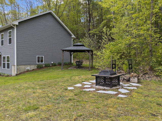 2 Ball Park Rd, Lewiston, ME 04240 - view of green lawn featuring a gazebo and an outdoor fire pit