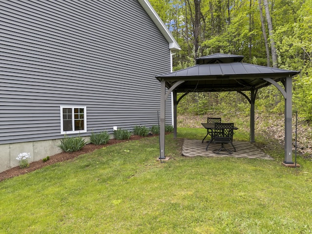 2 Ball Park Rd, Lewiston, ME 04240 - view of grassy yard with a gazebo and a patio area