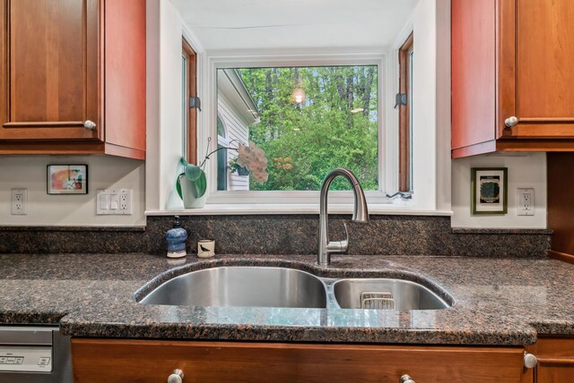 3 Payneton Hill Rd, York, ME 03909 - kitchen view of a sink, brown cabinets, dark stone counters, and dishwasher