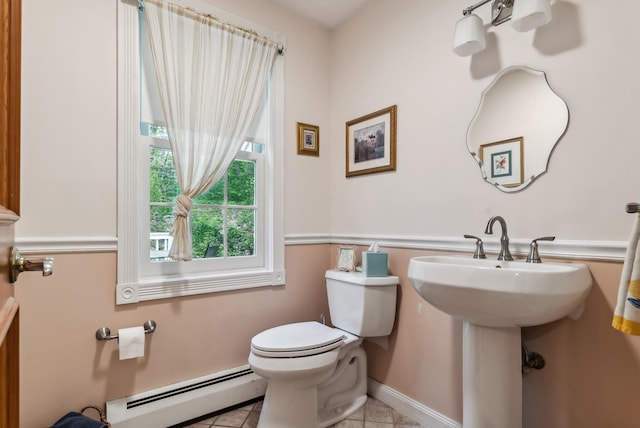3 Payneton Hill Rd, York, ME 03909 - half bath featuring a baseboard heating unit, toilet, tile patterned floors, and baseboards