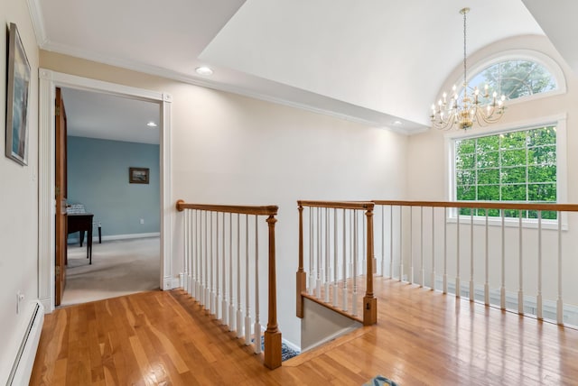 3 Payneton Hill Rd, York, ME 03909 - hallway featuring a baseboard radiator, an upstairs landing, a chandelier, wood finished floors, and recessed lighting
