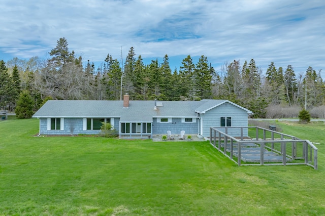 4 Seawall Point Ln, Southwest Harbor, ME 04679 - rear view of property featuring a chimney, a yard, and a shingled roof