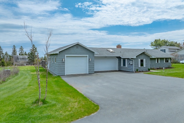 4 Seawall Point Ln, Southwest Harbor, ME 04679 - ranch-style home featuring a chimney, an attached garage, a front yard, asphalt driveway, and a shingled roof