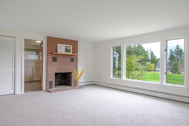 4 Seawall Point Ln, Southwest Harbor, ME 04679 - unfurnished living room with carpet floors, a baseboard radiator, and a brick fireplace