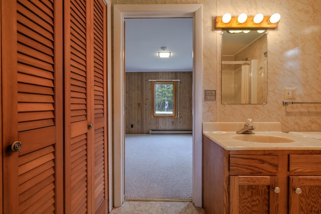 4 Seawall Point Ln, Southwest Harbor, ME 04679 - bathroom with a closet, vanity, baseboard heating, and a shower