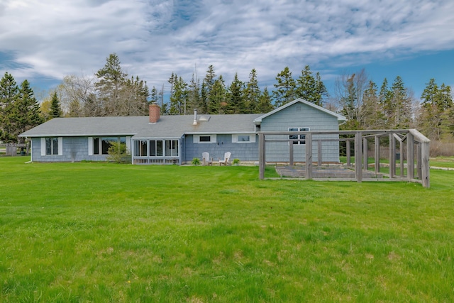 4 Seawall Point Ln, Southwest Harbor, ME 04679 - back of house with a chimney and a yard