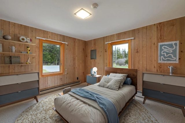 4 Seawall Point Ln, Southwest Harbor, ME 04679 - carpeted bedroom featuring a baseboard heating unit, multiple windows, and wooden walls