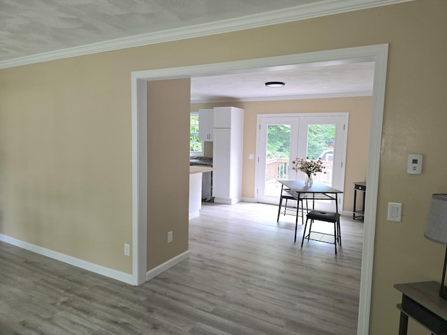 60 Rolling Rdg, Jay, ME 04239 - hall with ornamental molding, wood finished floors, baseboards, and french doors