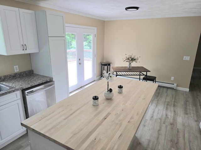 60 Rolling Rdg, Jay, ME 04239 - dining area with french doors, crown molding, light wood finished floors, a baseboard radiator, and baseboards