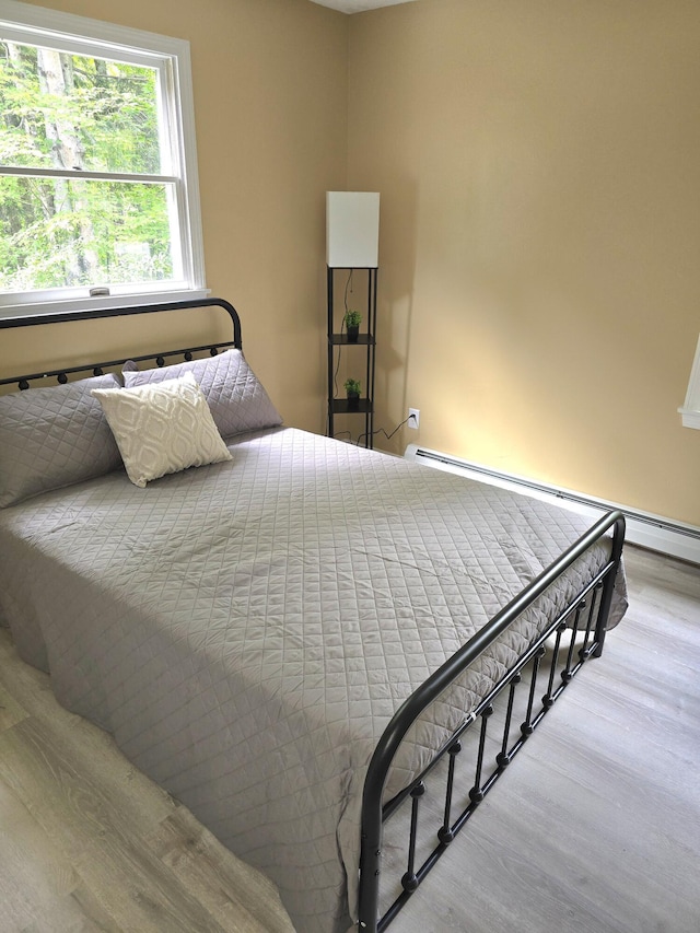 60 Rolling Rdg, Jay, ME 04239 - bedroom with wood finished floors and baseboard heating
