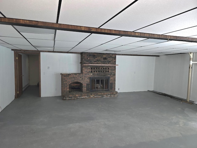 60 Rolling Rdg, Jay, ME 04239 - finished below grade area with a brick fireplace, a paneled ceiling, and wood walls