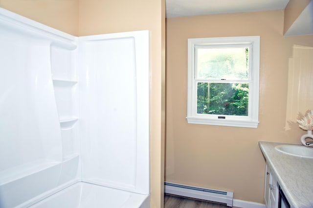 60 Rolling Rdg, Jay, ME 04239 - full bathroom featuring a baseboard radiator, plenty of natural light, and vanity