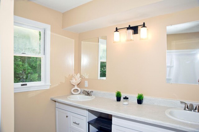 60 Rolling Rdg, Jay, ME 04239 - full bath with double vanity and plenty of natural light