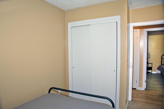 60 Rolling Rdg, Jay, ME 04239 - bedroom featuring wood finished floors and a closet