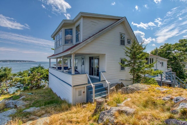16 Tilton Ln, Southport, ME 04576 - view of front facade with a water view