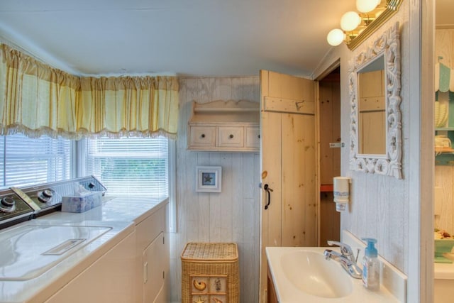 16 Tilton Ln, Southport, ME 04576 - bathroom featuring washing machine and clothes dryer and vanity